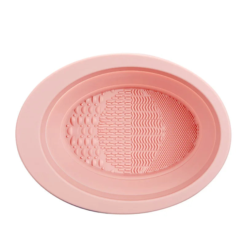 Silicone makeup brush cleaner pad from Showlu Smart General with textured surface for easy brush cleaning and maintenance.