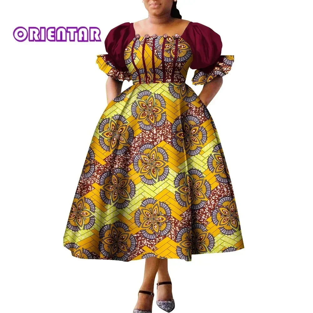 African print puff sleeve high waist Ankara cotton gown by SHOWLU FASHION STORE, featuring vibrant patterns and elegant design.