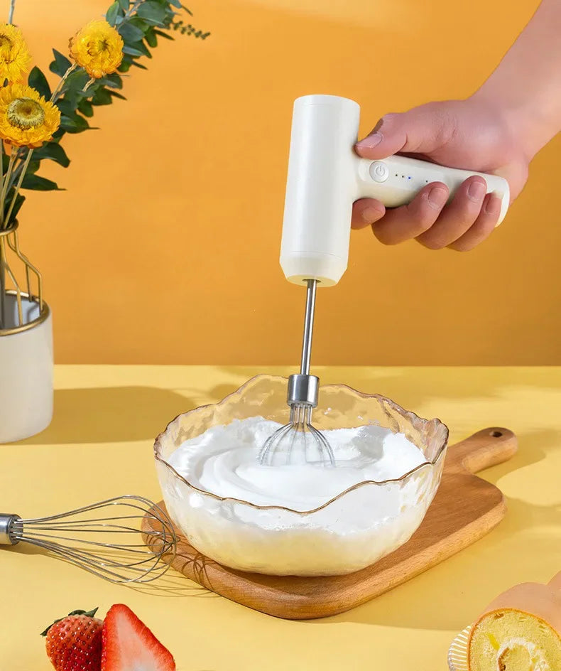 Showlu Smart General electric egg beater with stainless steel beaters and ergonomic handle, ready for kitchen baking tasks.