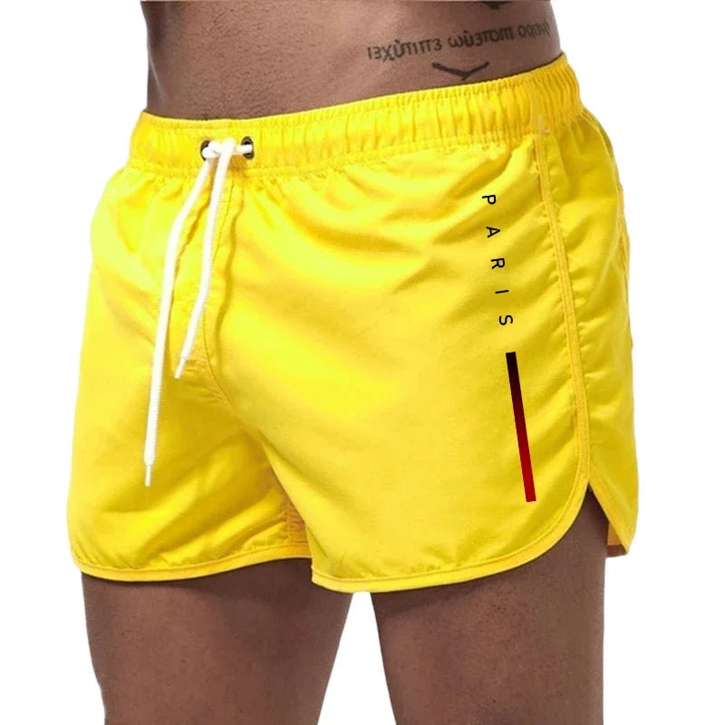 Men's casual board shorts by Showlu Fashion, featuring a sporty design for beach, surfing, running, and gym activities.