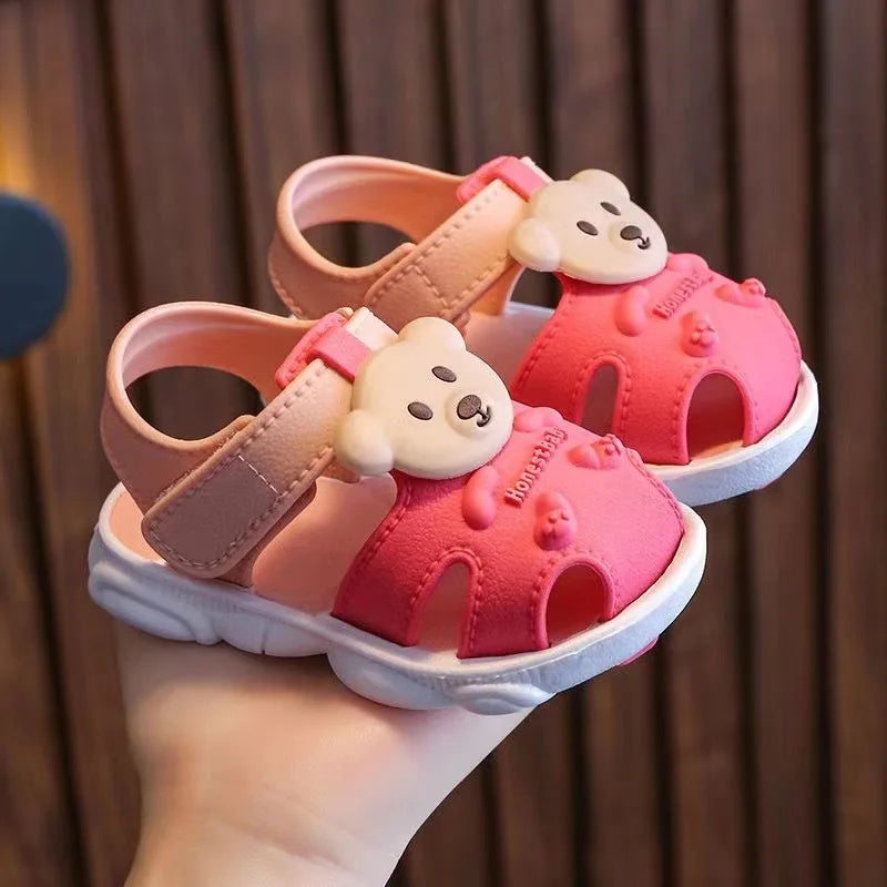 Showlu Baby open-toe clogs with soft soles and anti-slip design, perfect for infant walking shoes.