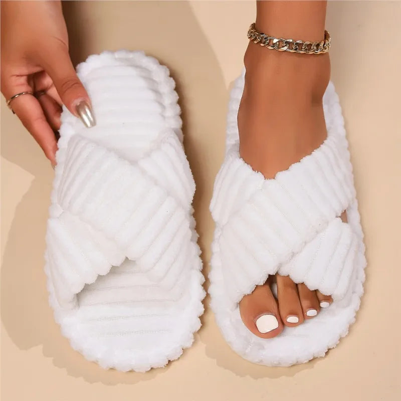 Soft pink women's corduroy memory foam slippers with crossband design, ideal for cozy indoor housewear.