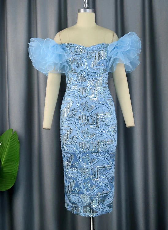 Elegant navy blue Nittonic off-shoulder sequin evening gown with floral embroidery and midi length, designed for formal occasions.