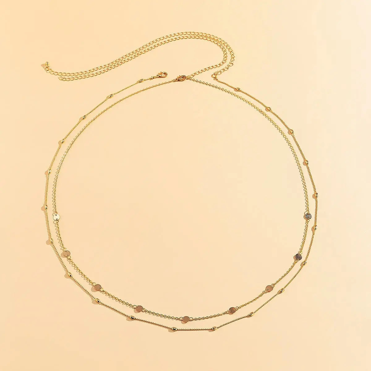 Vintage Y2K belly chain with thin copper beads, body jewelry that wraps around the waist, stylish streetwear accessory.