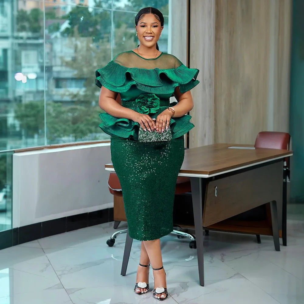 Elegant African sequin evening gown with ruffle details, perfect for women’s party or formal events.