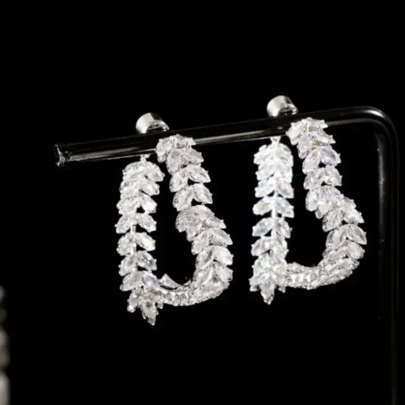 SHOWLU FASHION zircon leaf stud earrings featuring Korean-style copper jewelry with intricate leaf design and sparkling zircon accents.