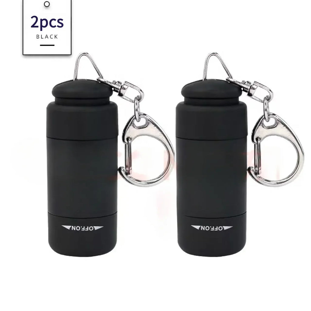 Showlu portable LED micro pocket flashlight with USB rechargeable keychain, compact design, and bright illumination.