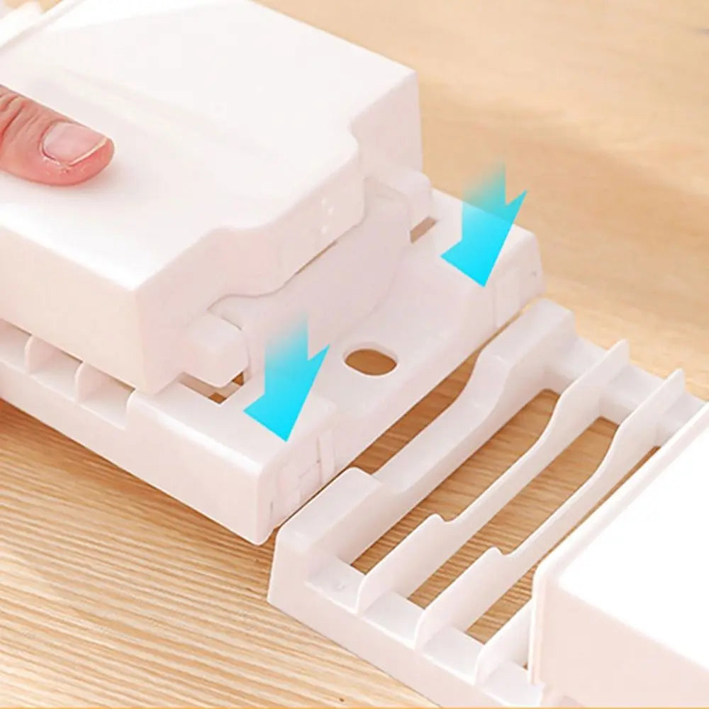 Foldable dish drying rack from Showlu Smart General with multiple tiers and stainless steel design for drying dishes and utensils
