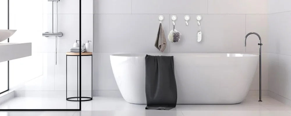 Wall mounted storage hooks by Showlu Smart General, showing sturdy hooks on a wall for organizing tools and accessories.