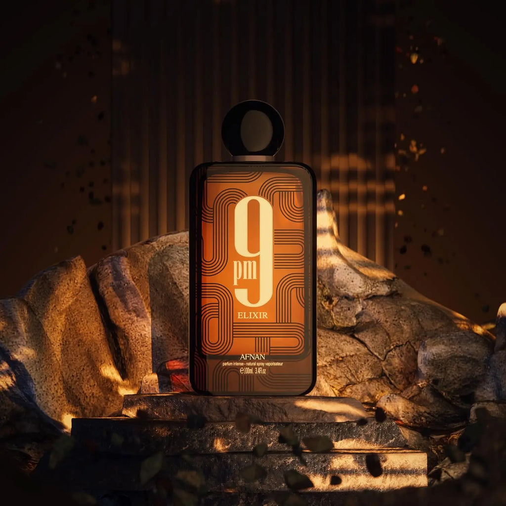 Afnan 9 PM Elixir Unisex perfume bottle, 3.4 fl oz, featuring a sleek design and elegant packaging.