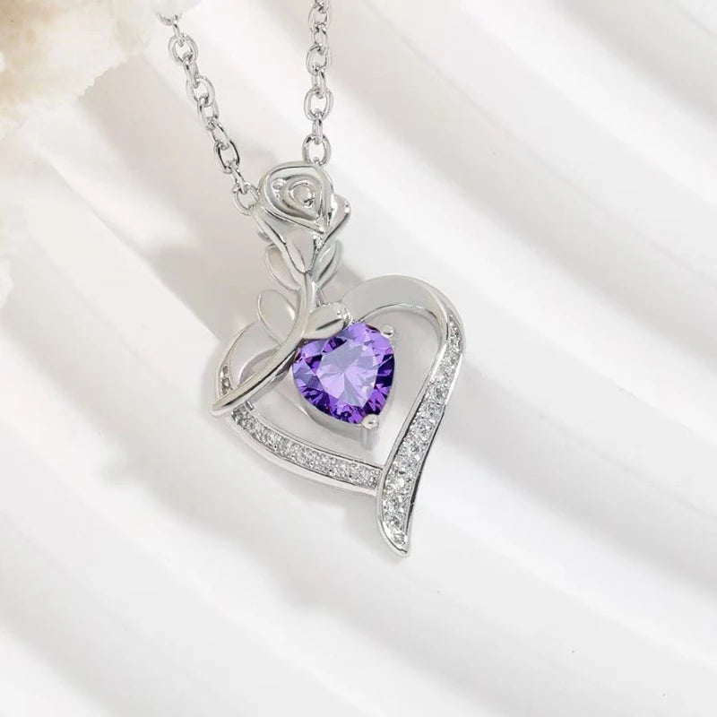 Heart-shaped pendant necklace by ZHIXUN featuring hollow zinc alloy design, stylish party jewelry with a delicate chain.