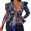 African print women's dashiki top with V-neck and long sleeves, made of cotton, featuring bold traditional patterns.