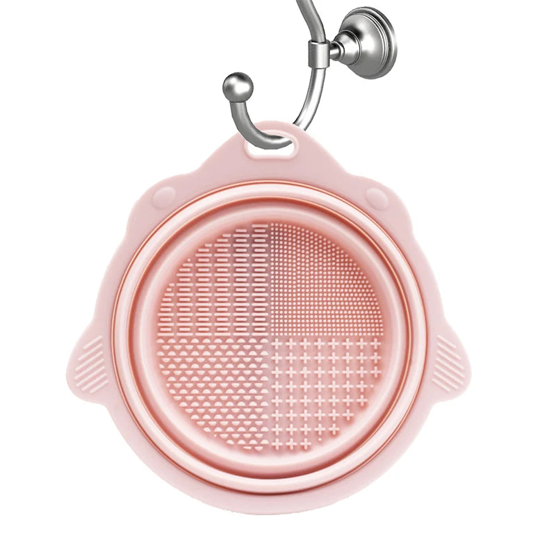 Showlu Smart General silicone makeup brush cleaner pad with textured surface for easy brush cleaning and maintenance.