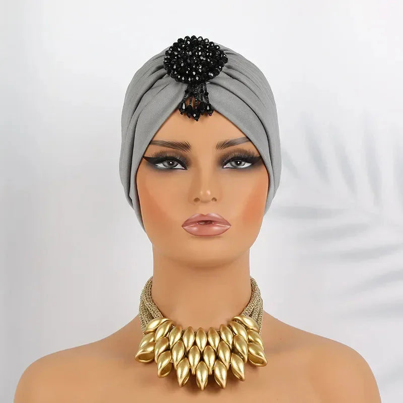 Showlu Fashion women's diamond pleated hijab turban with stylish wrap and chemo cap design, featuring elegant fabric and intricate pleats.