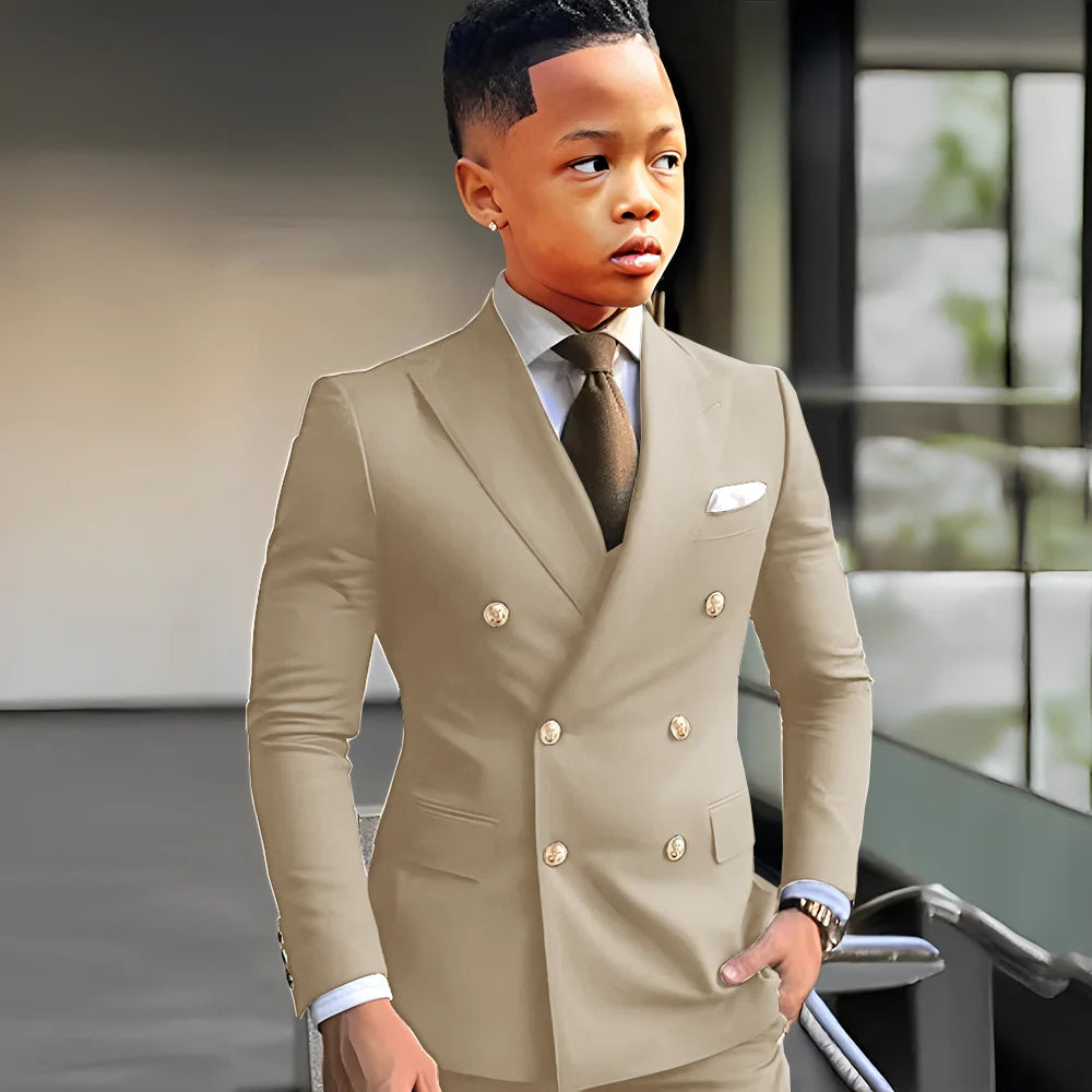 Elegant navy blue boys' suit with peak lapel, double-breasted design, suitable for weddings, parties, and formal occasions.