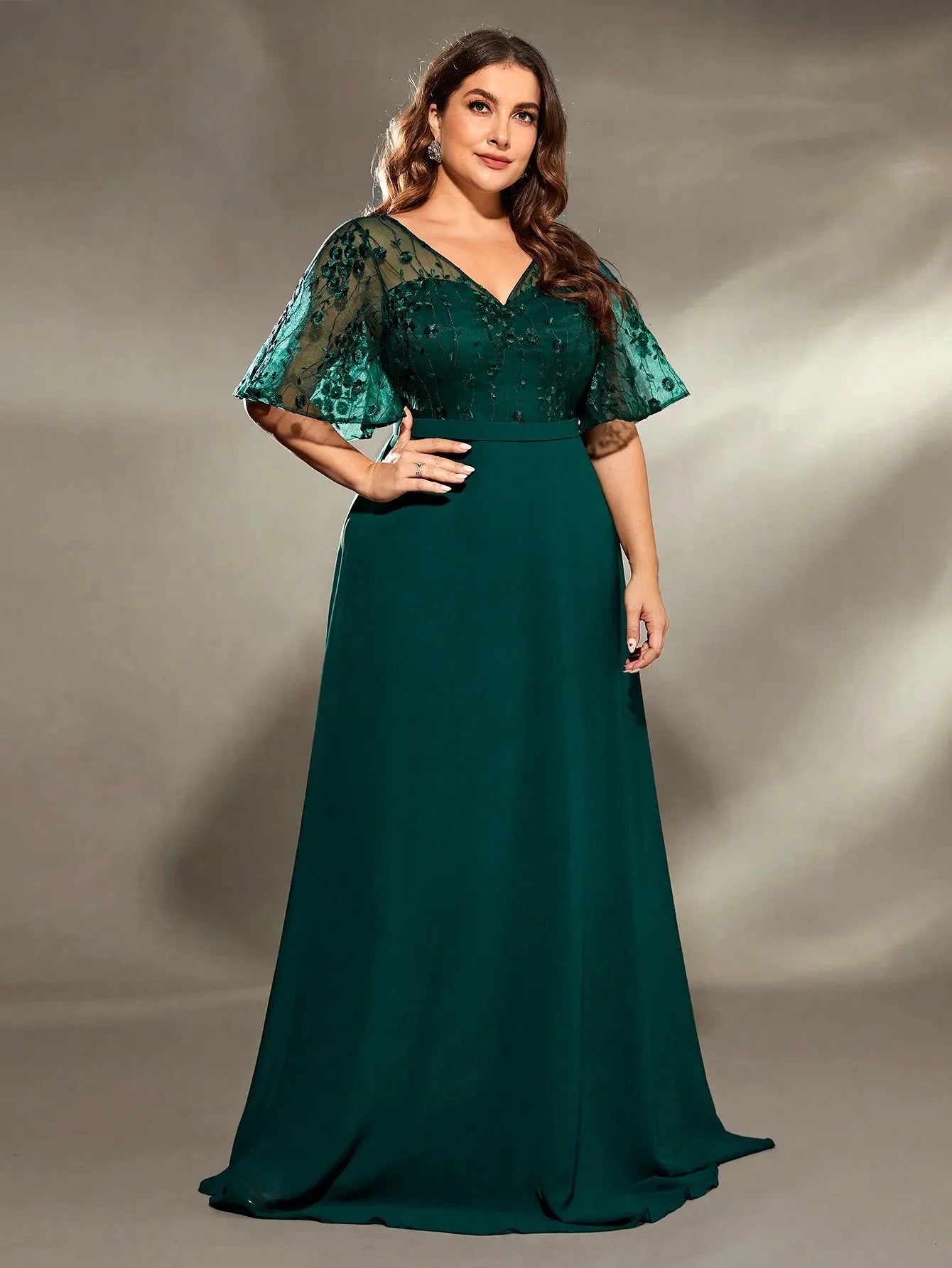 Plus size SHOWLU FASHION STORE V-neck embroidered chiffon evening gown with flowing skirt and intricate embroidery detail.
