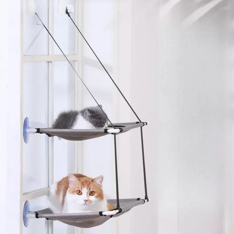 Showlu Double Decker Cat Window Hammock hanging on a window, made of durable Oxford cloth, designed for comfortable feline lounging.