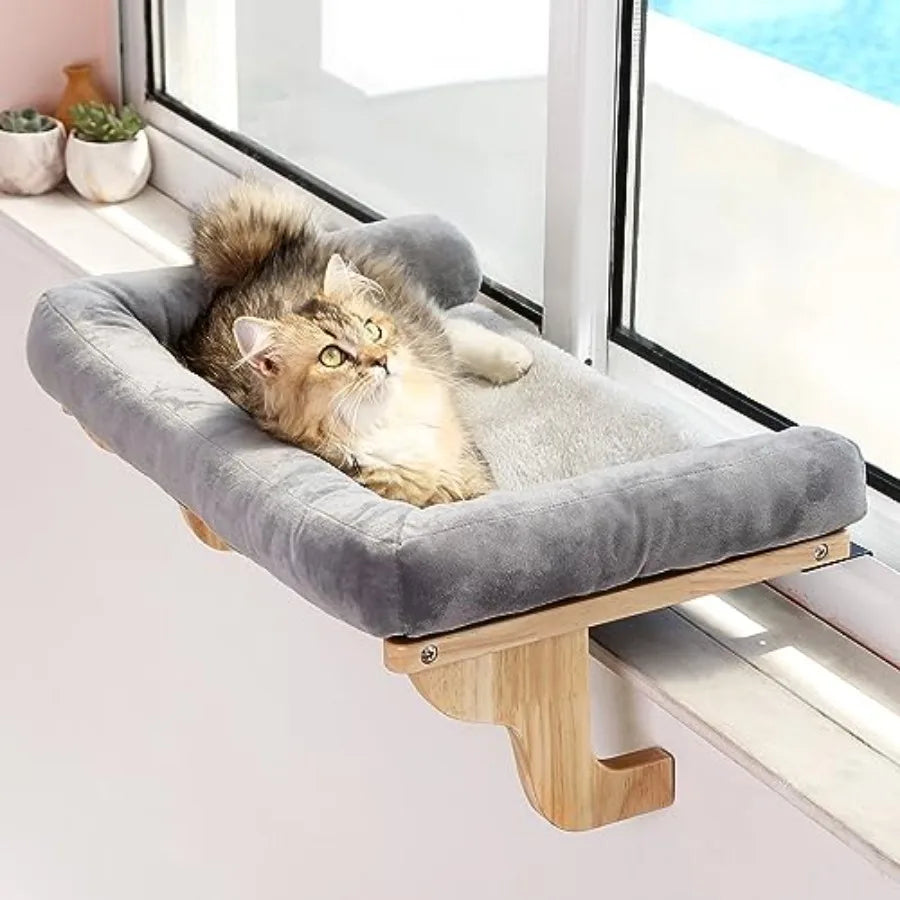 Showlu Cat Window Perch with orthopedic hardwood hammock and bolster, providing a cozy resting spot for cats near the window.