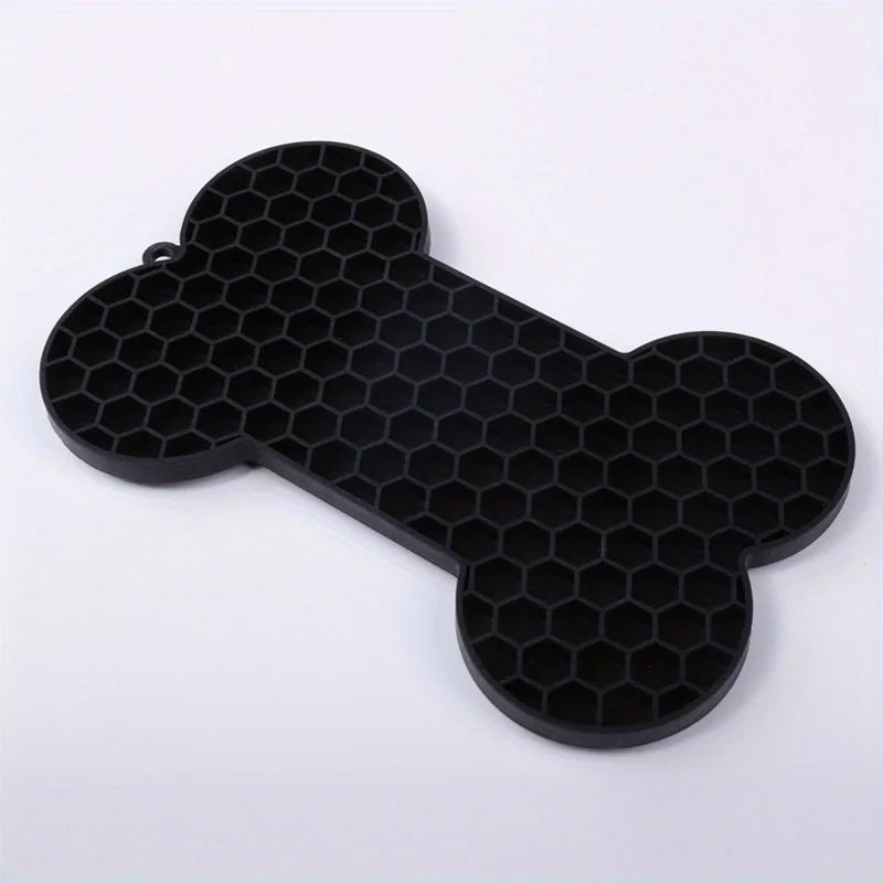 Silicone dog slow food pad and licking mat for pets, showing the textured surface for feeding and licking, suitable for dogs and cats.