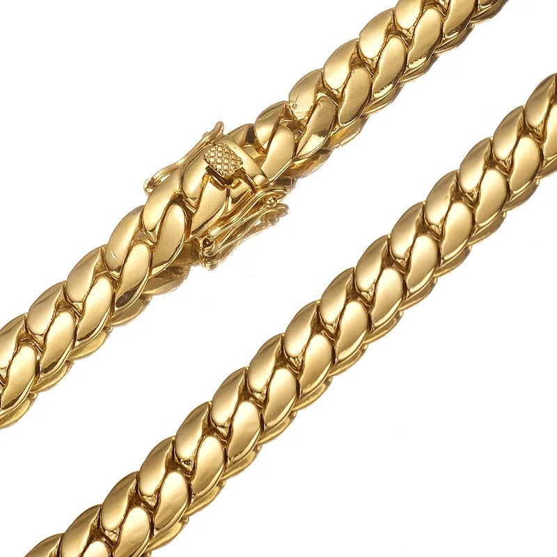 Gold Cuban link chain necklace for men, rapper jewelry style, showing the shiny, thick tank chain with a smooth finish.