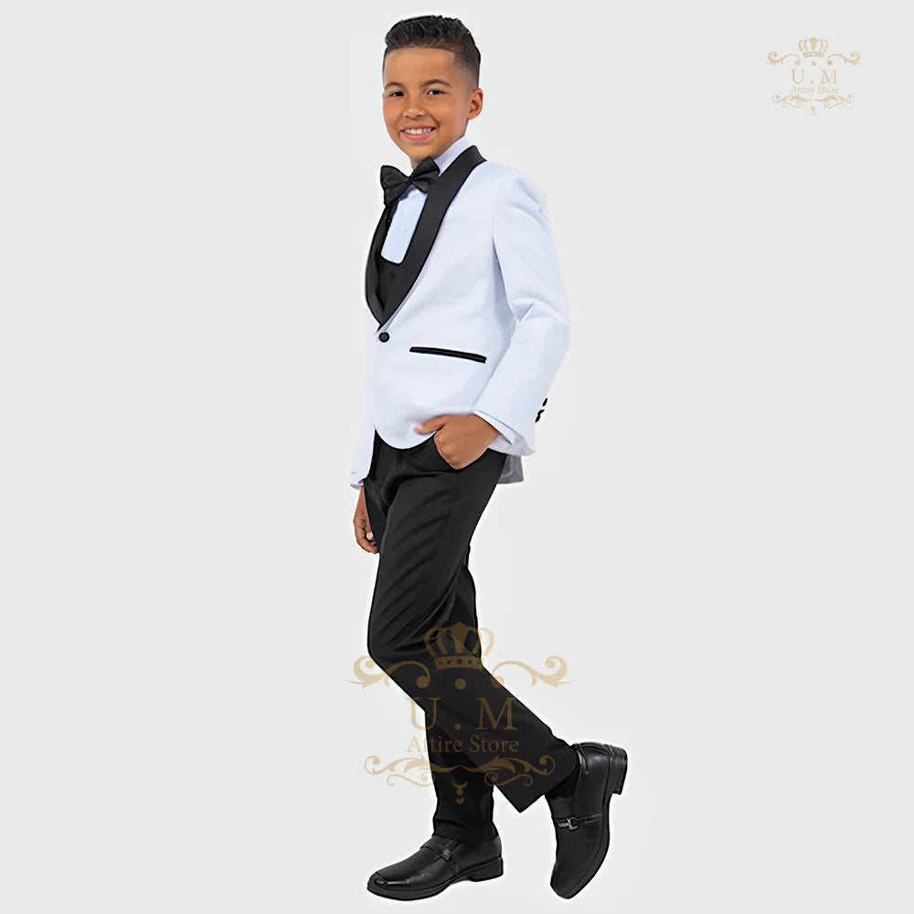 Boy wearing SHOWLU FASHION STORE ZHIO 3-piece white tuxedo suit with jacket, vest, and pants for formal occasions.