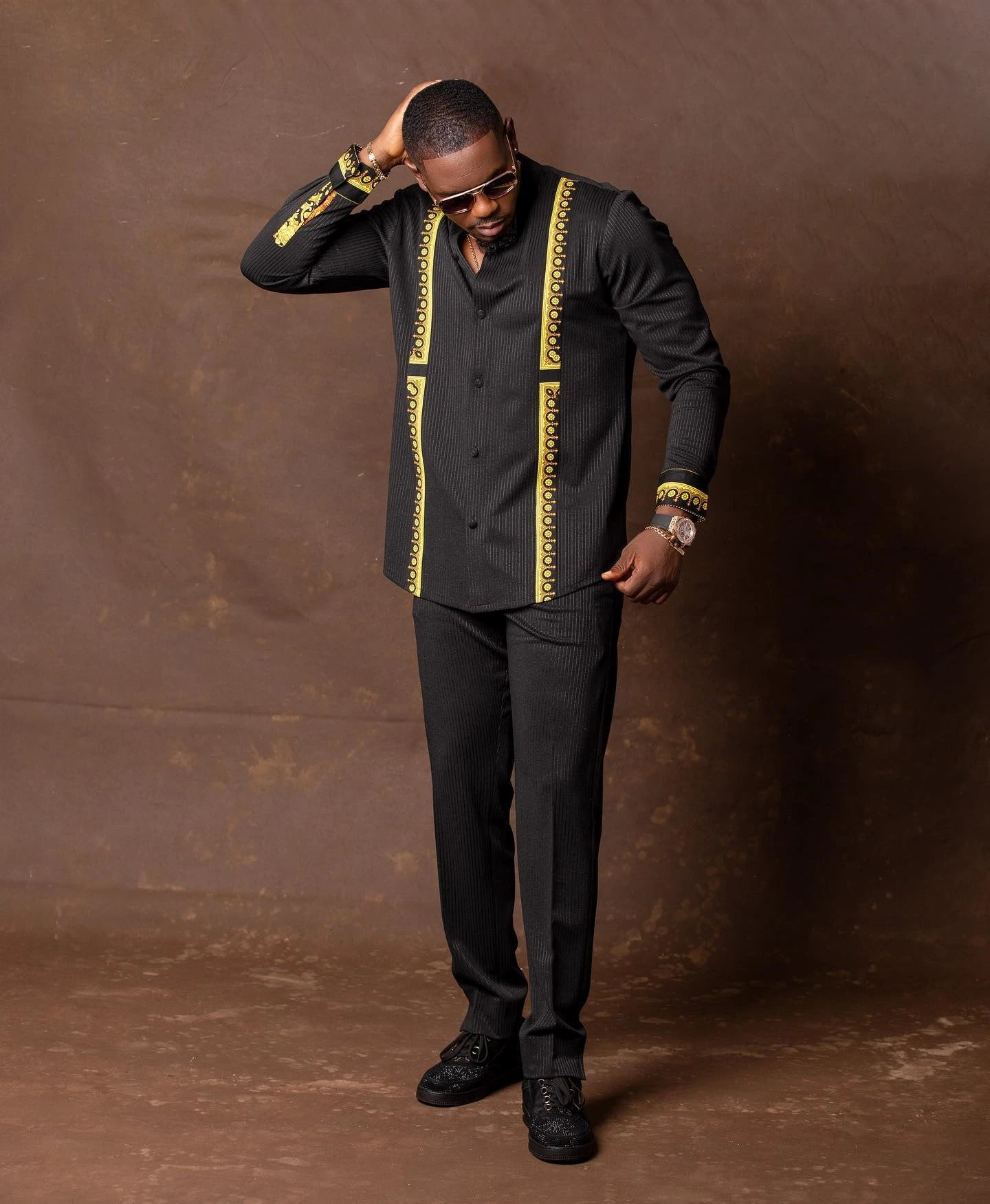 White Showlu Men's Kaunda suit, traditional African 2-piece cotton set with intricate patterns and comfortable fit.