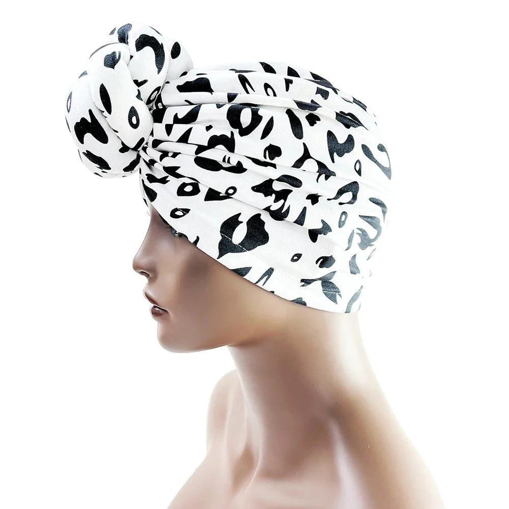 SHOWLU floral polyester knotted head wrap, luxury party headdress with elegant floral design and stylish knot detail.