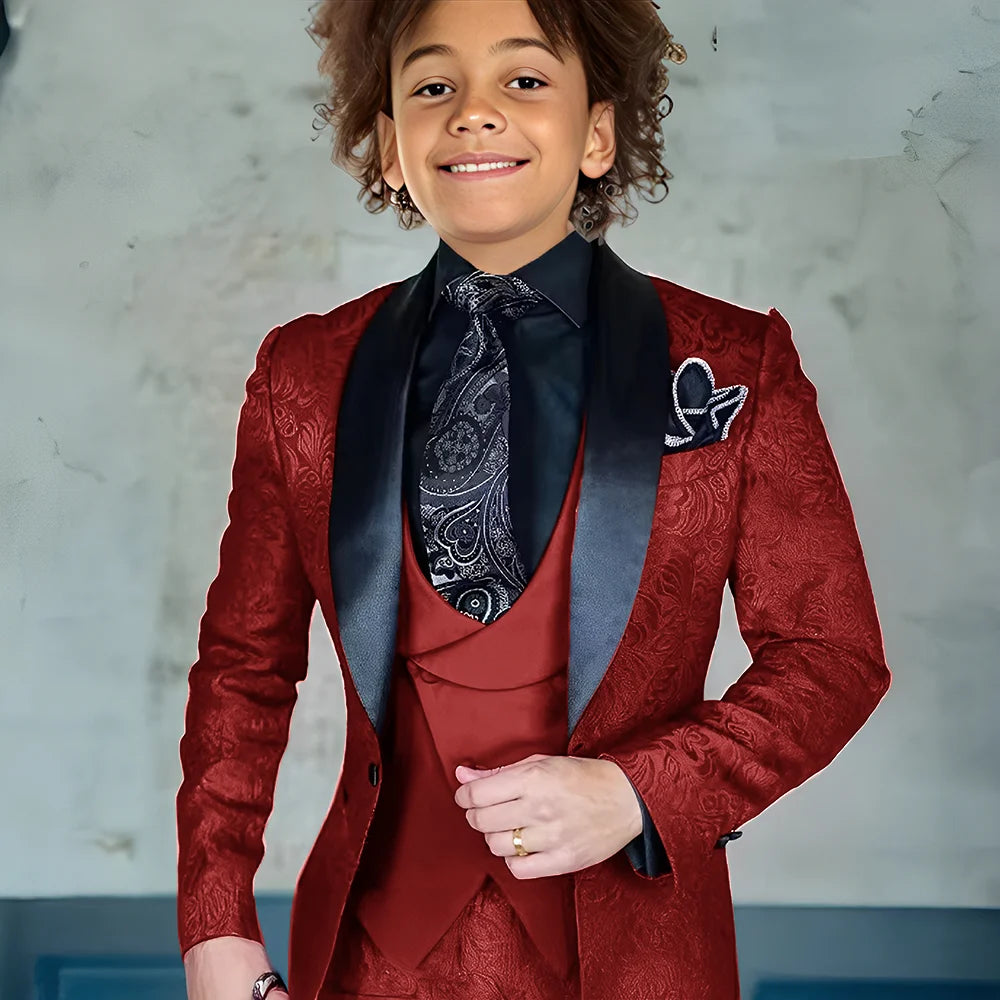 Burgundy jacquard boys' 3-piece suit with jacket, pants, and vest, perfect for formal weddings and special occasions.
