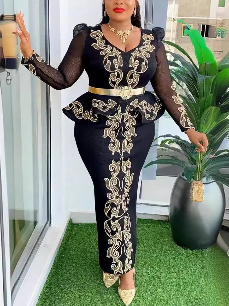 A woman wearing a black AOMEI Women's V-Neck luxury beaded evening gown with long sleeves and a sheath silhouette.
