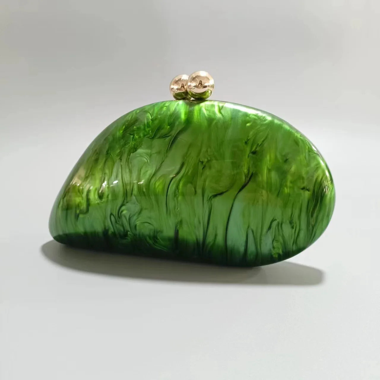 Blue acrylic shell-shaped clutch bag for women, designer evening party purse with pearl accents, perfect for stylish events.