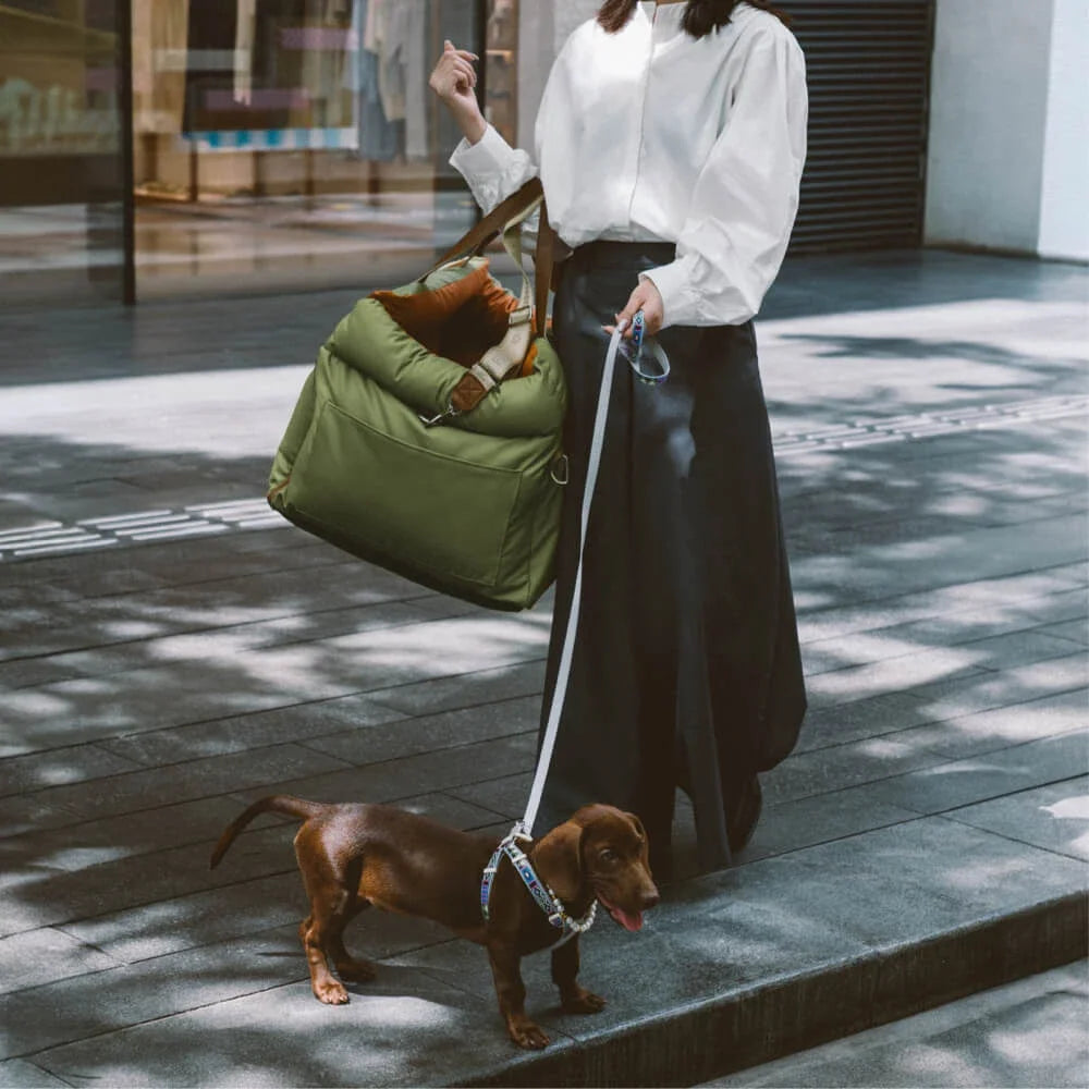 Luxury faux leather dog car seat by Showlu Fashion Store featuring a comfortable booster bed for pets in a sleek design.
