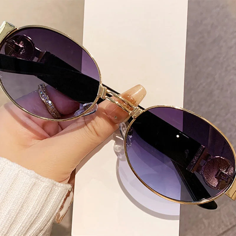Unisex UV400 fashion oval frame sunglasses with mirrored polarized lenses, stylish and protective for sunny days.
