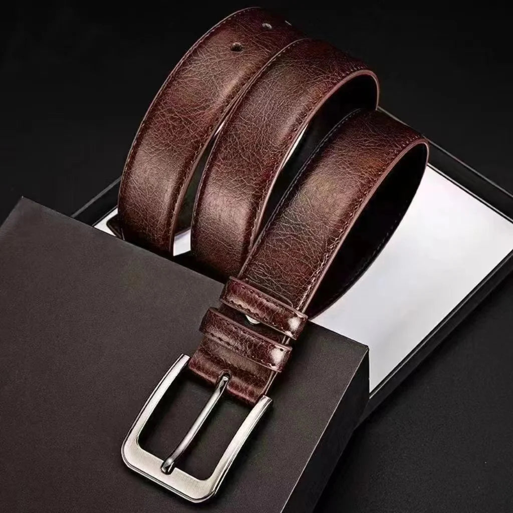 Men's genuine split leather belt with alloy needle buckle by Showlu Fashion, showcasing the high-quality leather and sleek buckle design.