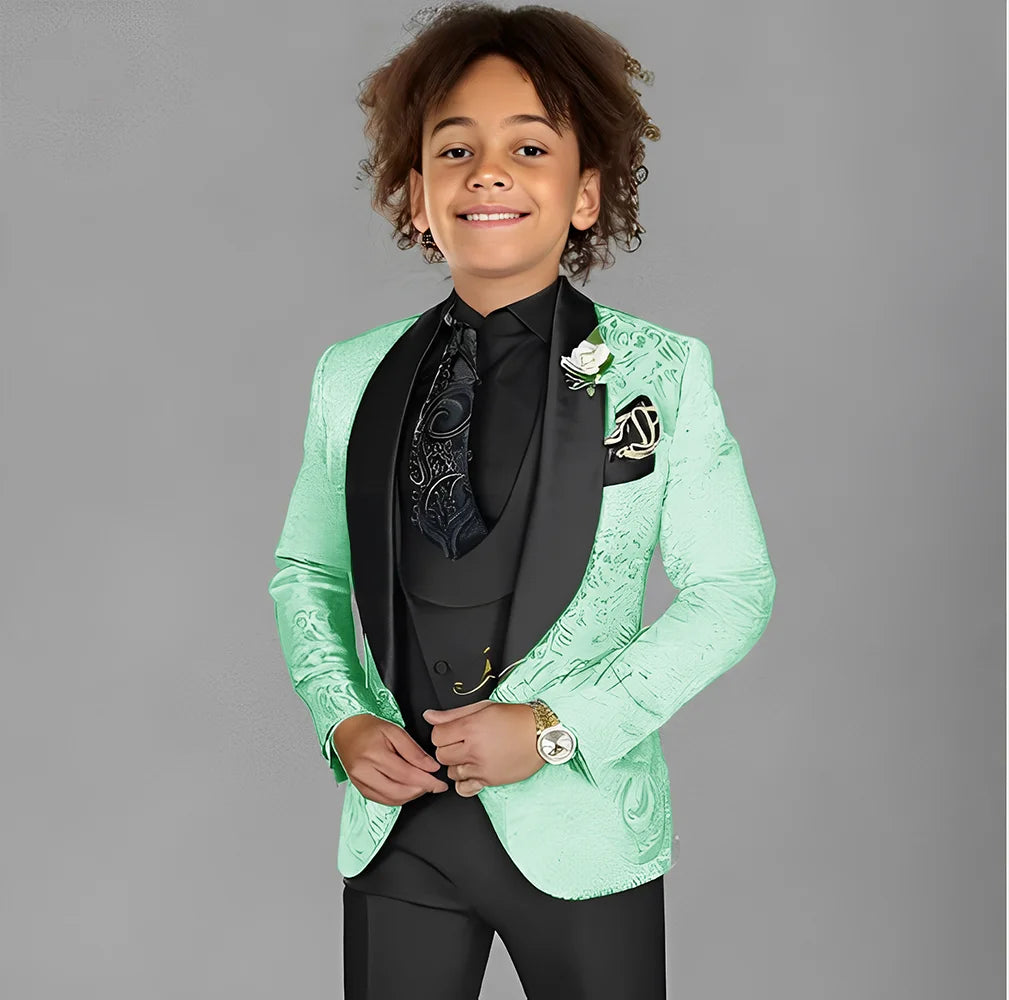 Jacquard boys' 3-piece suit by Showlu Fashion, featuring a tuxedo jacket, pants, and vest for kids' formal occasions.