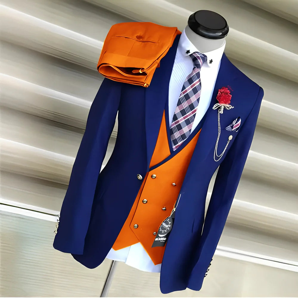 Royal blue men's 3-piece suit with yellow vest, tuxedo jacket, and pants, perfect for wedding or formal occasions.