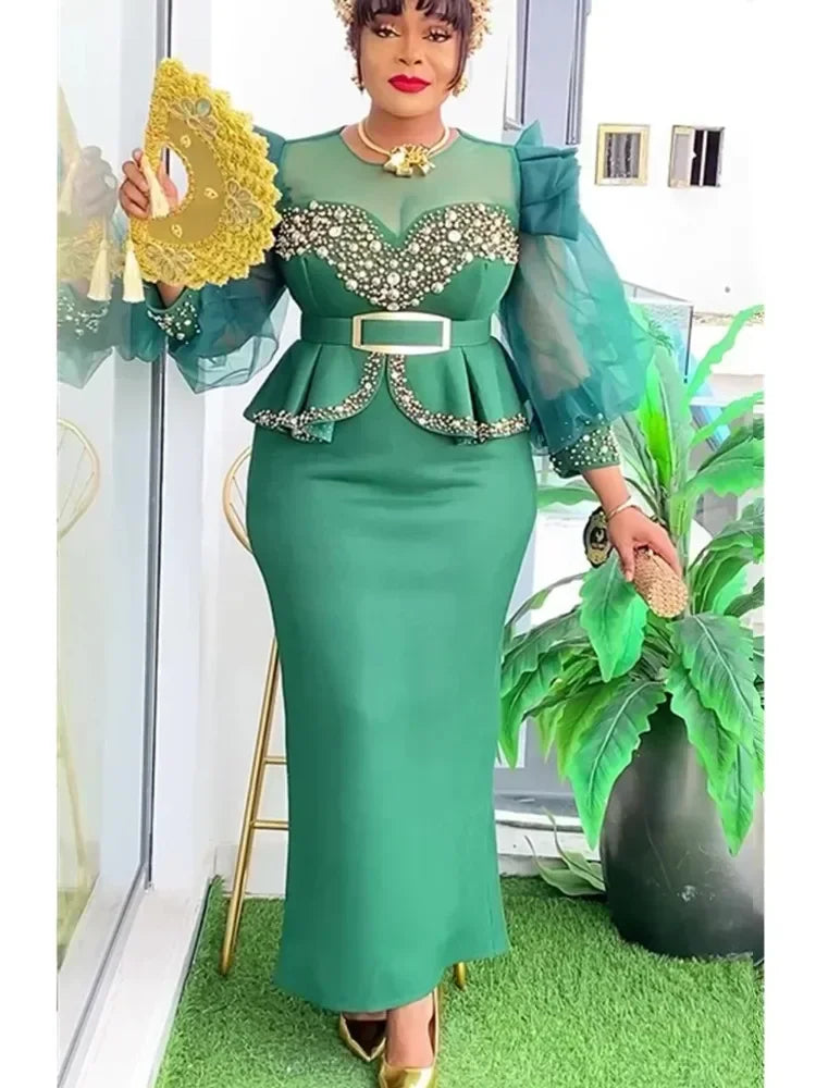 Elegant African dress for women featuring vibrant Dashiki Ankara fabric, long plus-size gown suitable for weddings or parties.