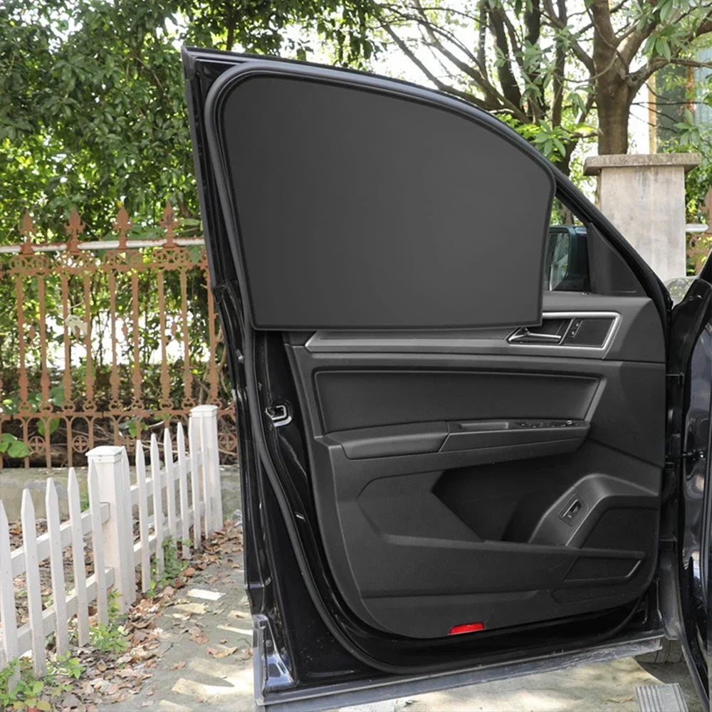 Showlu Smart General magnetic car sunshade attached to vehicle window, providing sun protection and glare reduction.
