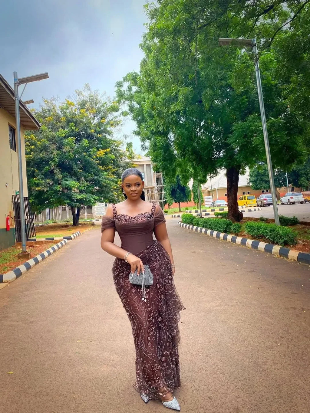 Fabulous brown lace evening dress with beads, traditional African wedding gown, designed for brides and special occasions.