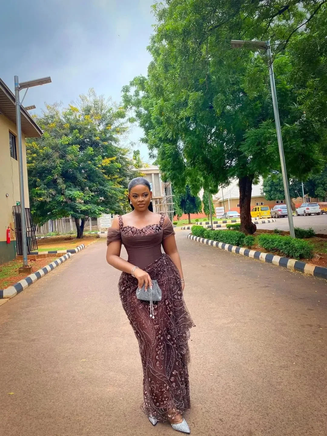Fabulous brown lace evening dress with beads, traditional African wedding gown, designed for brides and special occasions.