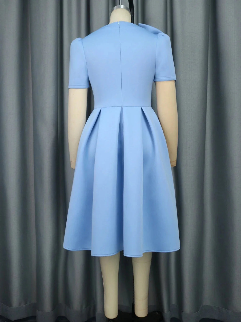AOMEI Women's Bow A-Line Skater Dress in elegant scuba fabric, featuring a bow detail, perfect for parties and stylish occasions.