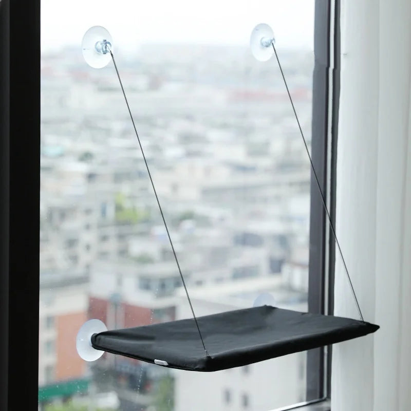 Showlu Smart General cat window hammock with soft fabric and suction cups for secure attachment to a window.