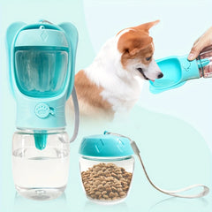 A portable light blue pet water bottle with a detachable food container and a carrying strap.