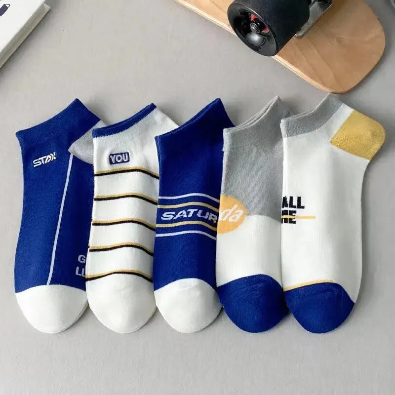 Three pairs of men's striped cotton sports ankle socks with breathable, sweat-absorbing fabric for comfort and style.