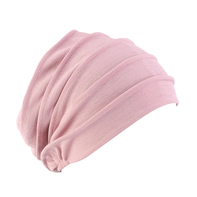 Solid color women’s turban cancer beanie by Showlu Fashion Store, elastic head cap with inner hijab for hair loss and chemo comfort.