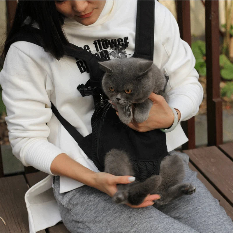 Showlu Adjustable Mesh Pet Carrier Backpack for cats and dogs, with breathable design and secure straps for comfortable outdoor travel.