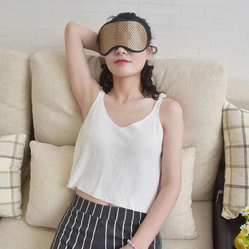 Showlu Smart General Maelsrom electric heat eye massage mask with soft fabric and adjustable strap, designed for relaxing eye therapy.