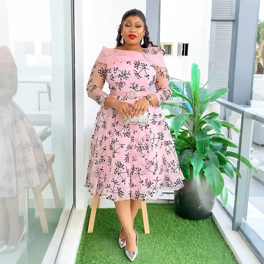 African print maxi dress by SHOWLU FASHION STORE, elegant plus size party gown with vibrant, colorful patterns and flowing fabric.