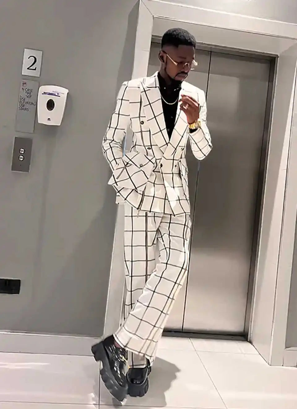 Men's double-breasted check wedding tuxedo by SHOWLU FASHION, featuring a stylish 2-piece suit set with classic design.