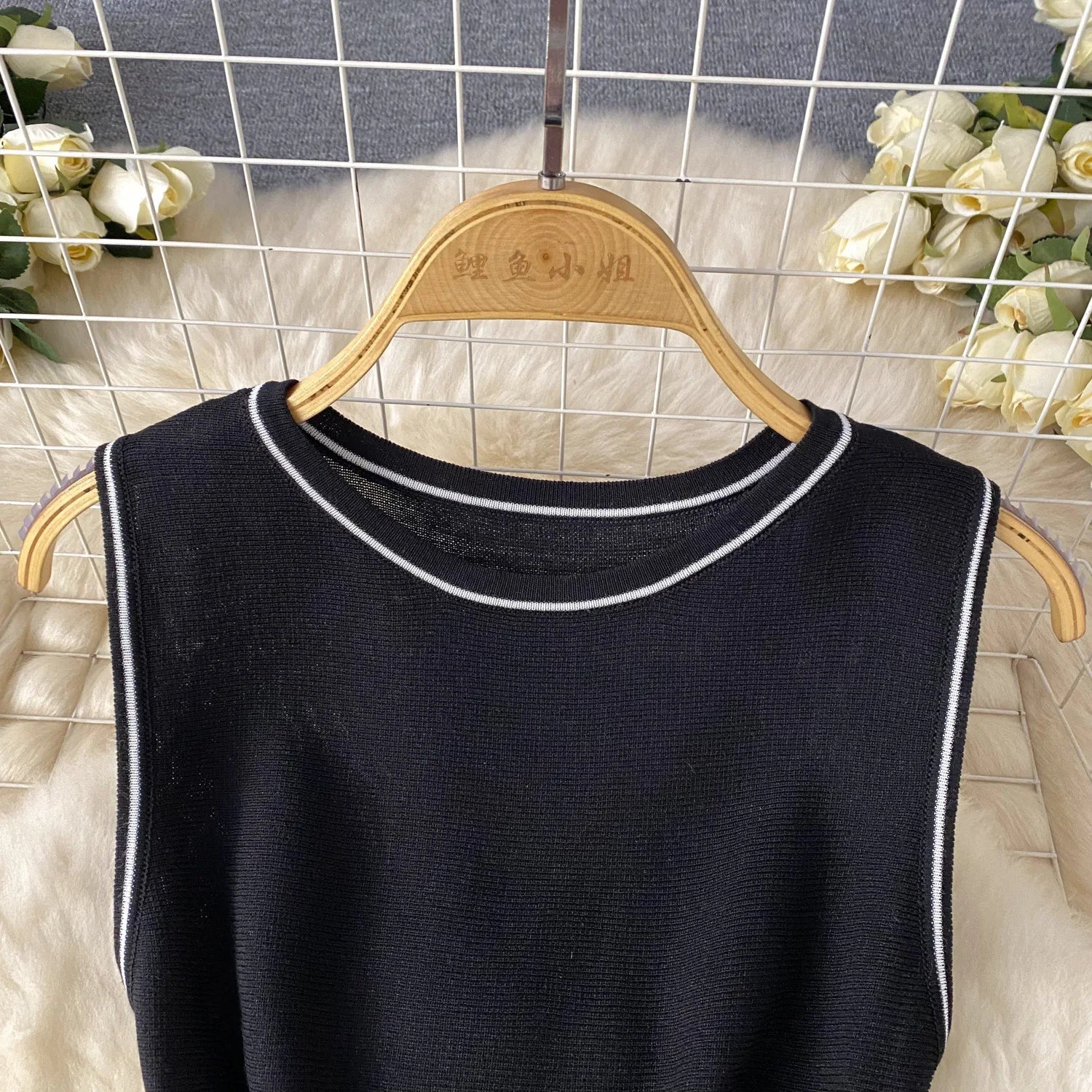 Showlu Fashion women's sleeveless knitted mini dress with A-line bodycon fit, round neck, perfect for streetwear and parties.