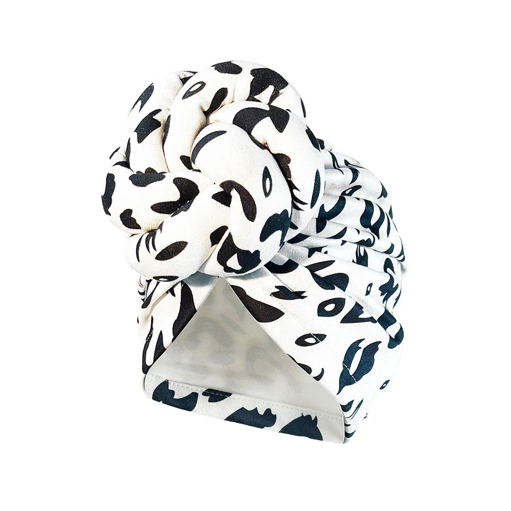 SHOWLU Knotted Head Wrap with luxury floral pattern, polyester fabric, stylish party headdress for women.